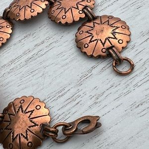 Copper concho bracelet.